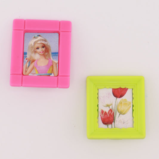 Two Framed Barbie Pictures